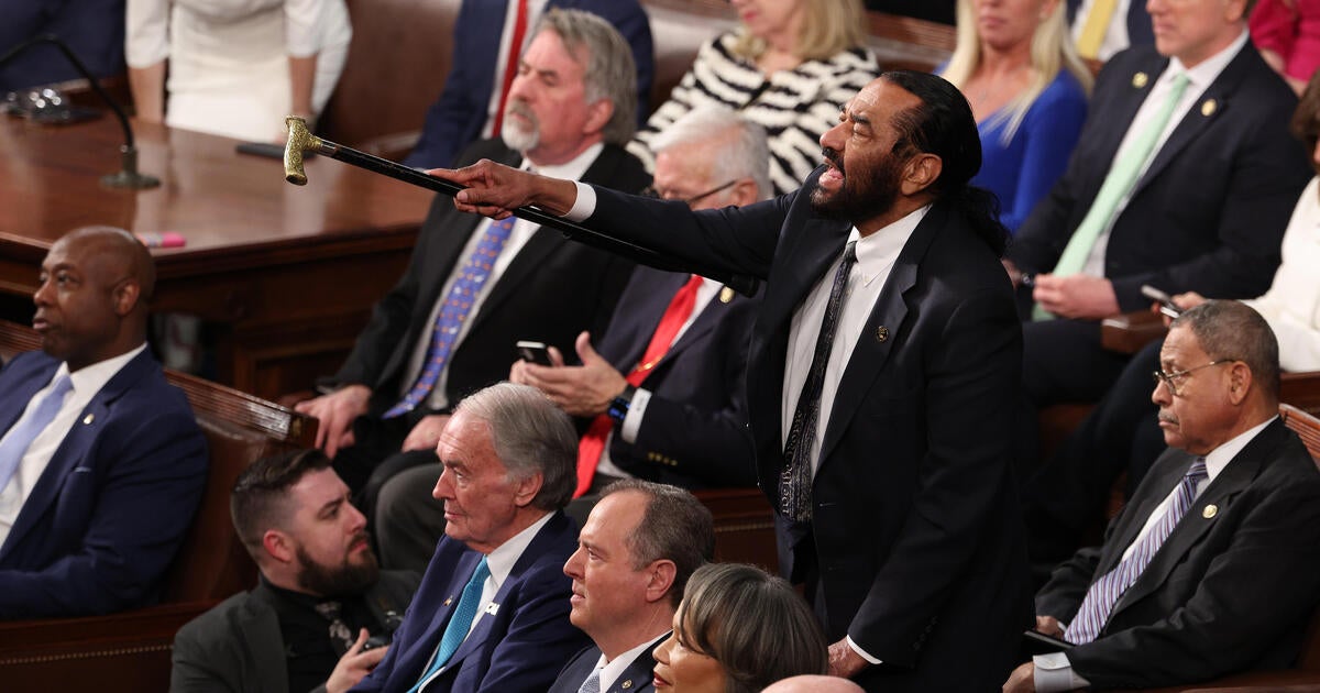 Congressman Al Green of Texas removed from Trump's speech for interrupting - CBS News