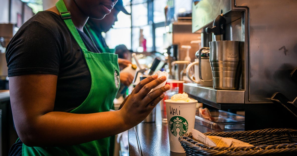 Starbucks changing its dress code for baristas. Here's the new look. - CBS News