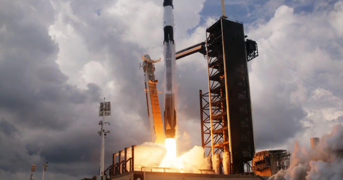NASA and SpaceX launch fresh crew to the space station on second try - CBS News