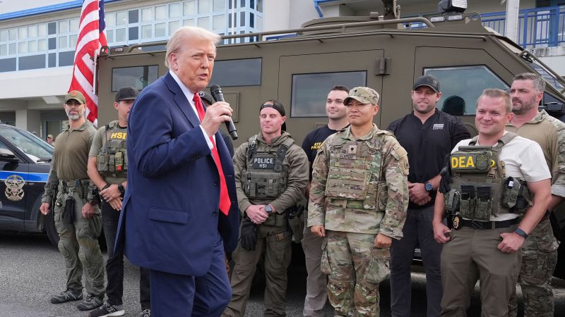 Trump says law enforcement crackdown will ‘go on to other places’ during appearance at police facility in DC | CNN Politics