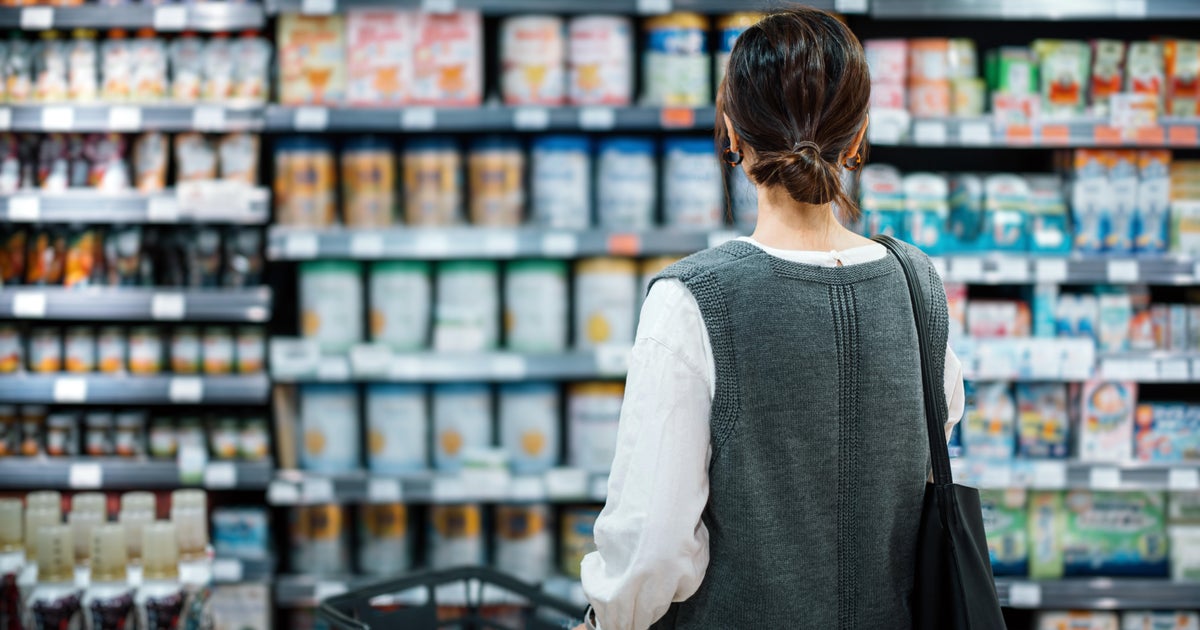 Tariffs are starting to bite consumers and businesses, economists say - CBS News