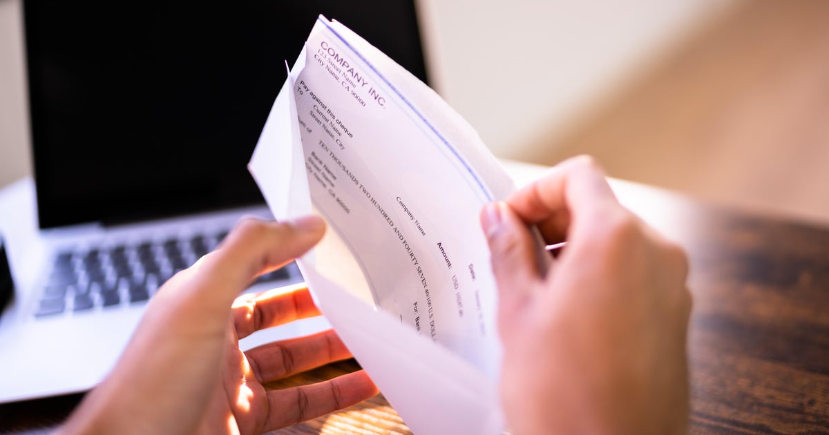 Here's what federal workers should know about getting retroactive pay - CBS News