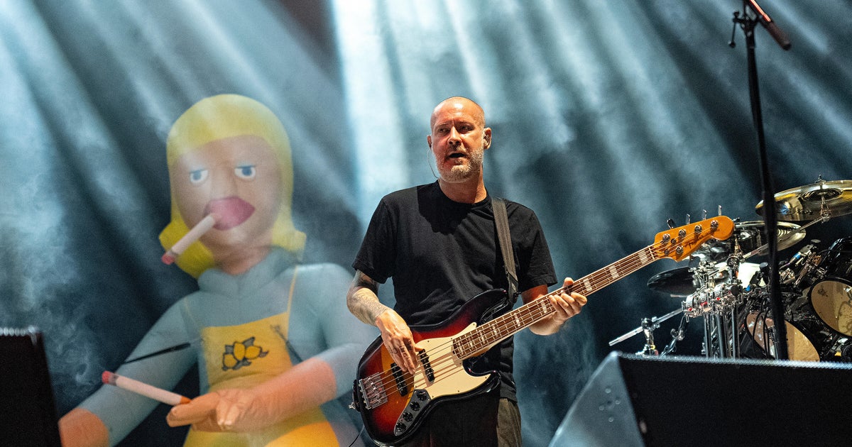 Sam Rivers, bass player for Limp Bizkit, has died at 48, the band says - CBS News