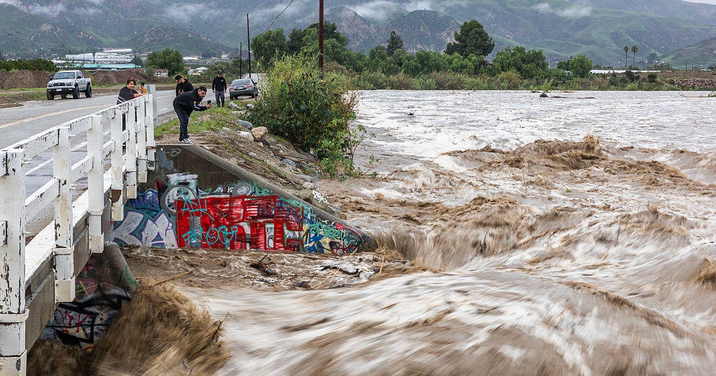California storm brings heavy rain and flooding, threatening homes and holiday travel - CBS News