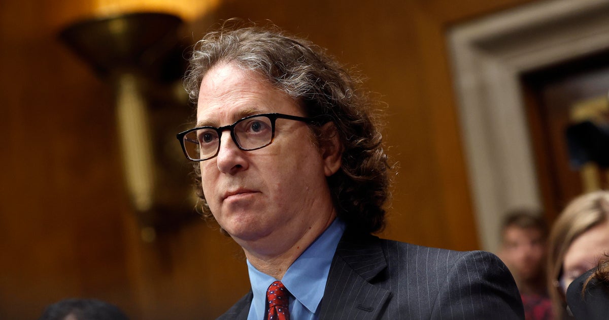 Judge blocks Trump from stripping security clearance from whistleblower attorney for now - CBS News
