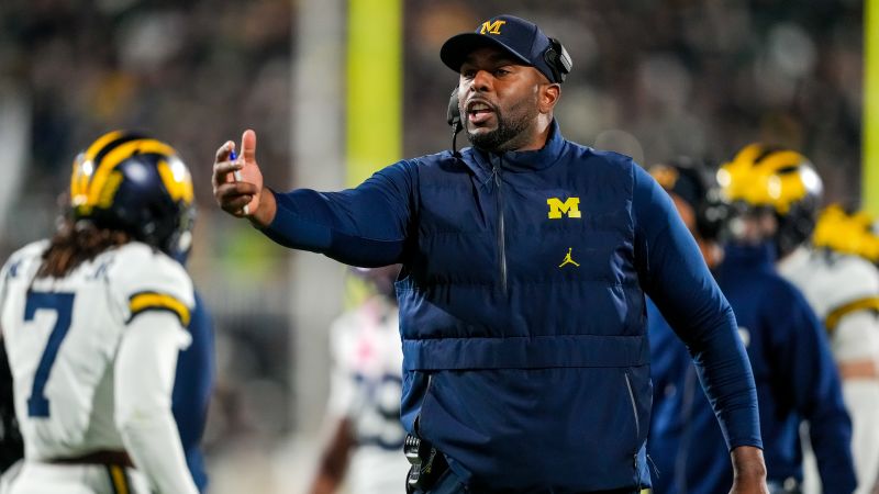 Sherrone Moore part of an active police investigation after being arrested hours after being fired by University of Michigan | CNN