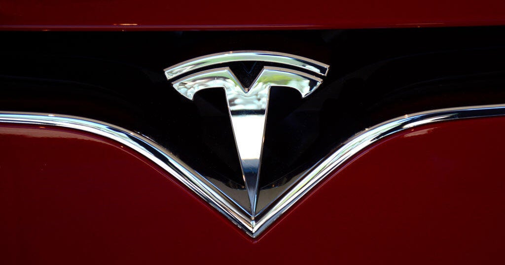 Tesla no longer world's biggest EV maker after its sales drop for second year in a row - CBS News