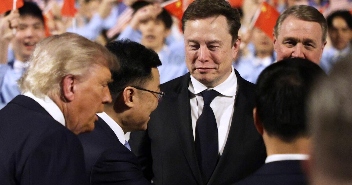 Why are so many U.S. CEOs in China with Trump, and what do they want? - CBS News