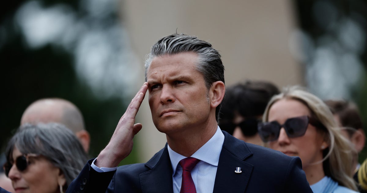 In France, Hegseth invokes immigration and