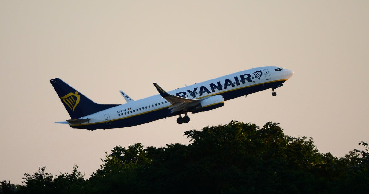 Man partially sucked out of broken Ryanair plane window during flight, fellow passenger says - CBS News
