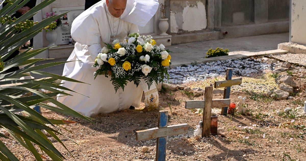 Pope Leo spends July 4th at migrant cemetery in Italy, meets with U.S. ambassador - CBS News