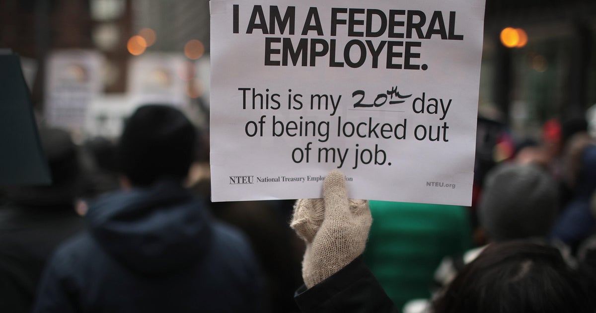 Federal workers sour on government work, decrying eroding job security - CBS News