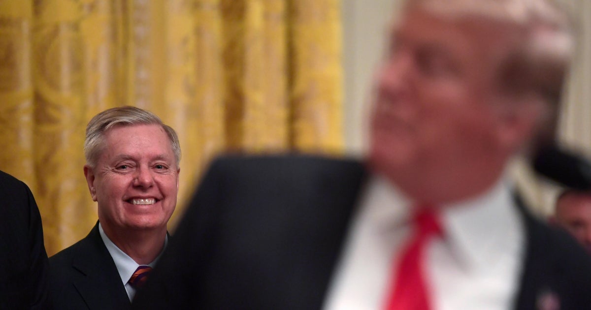Trump signs Russia sanctions bill championed by Lindsey Graham - CBS News