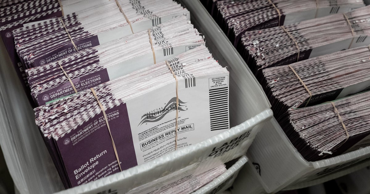 Postal Service mail voting rules face extended block as judge presses DOJ - CBS News