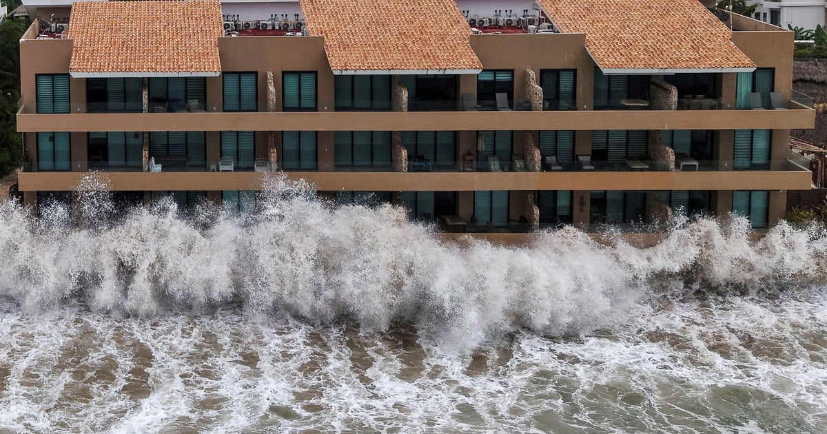 Hurricane Simon still hitting western Mexico after tropical systems kill 5 - CBS News